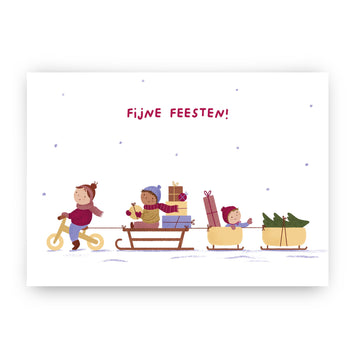Kerstkaart samen op de slee